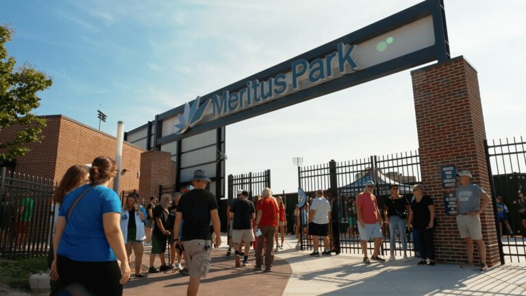 People walking in Meritus Park